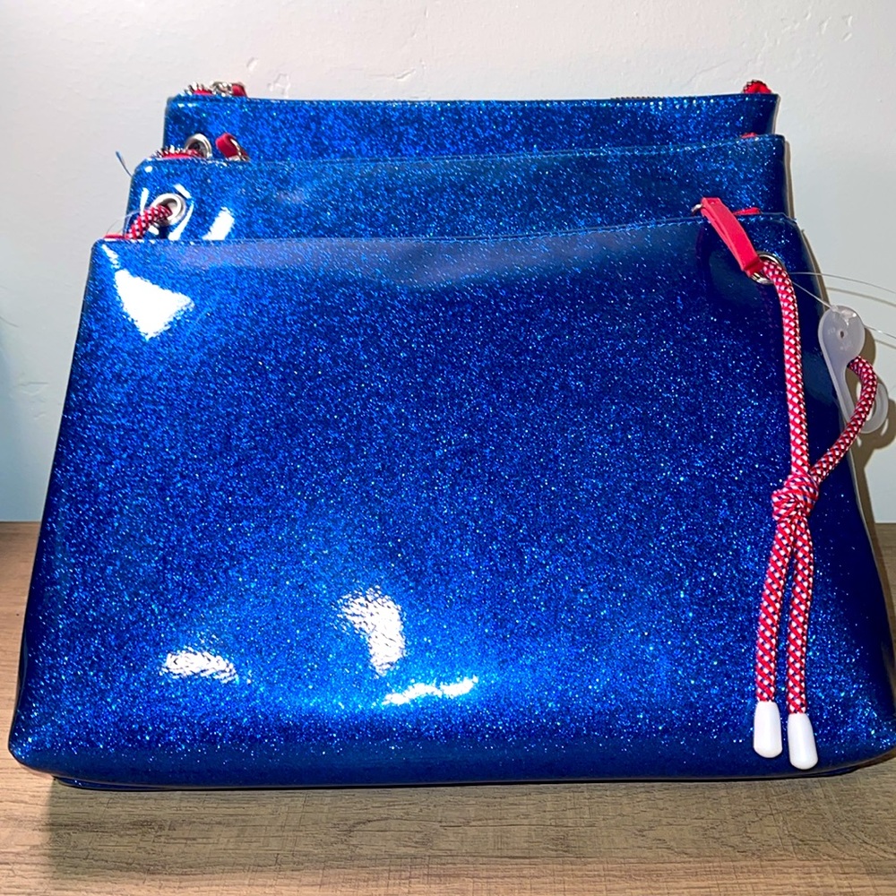 Bundle of 3. Large Glitter blue wristlets, makeup bag, or bag.